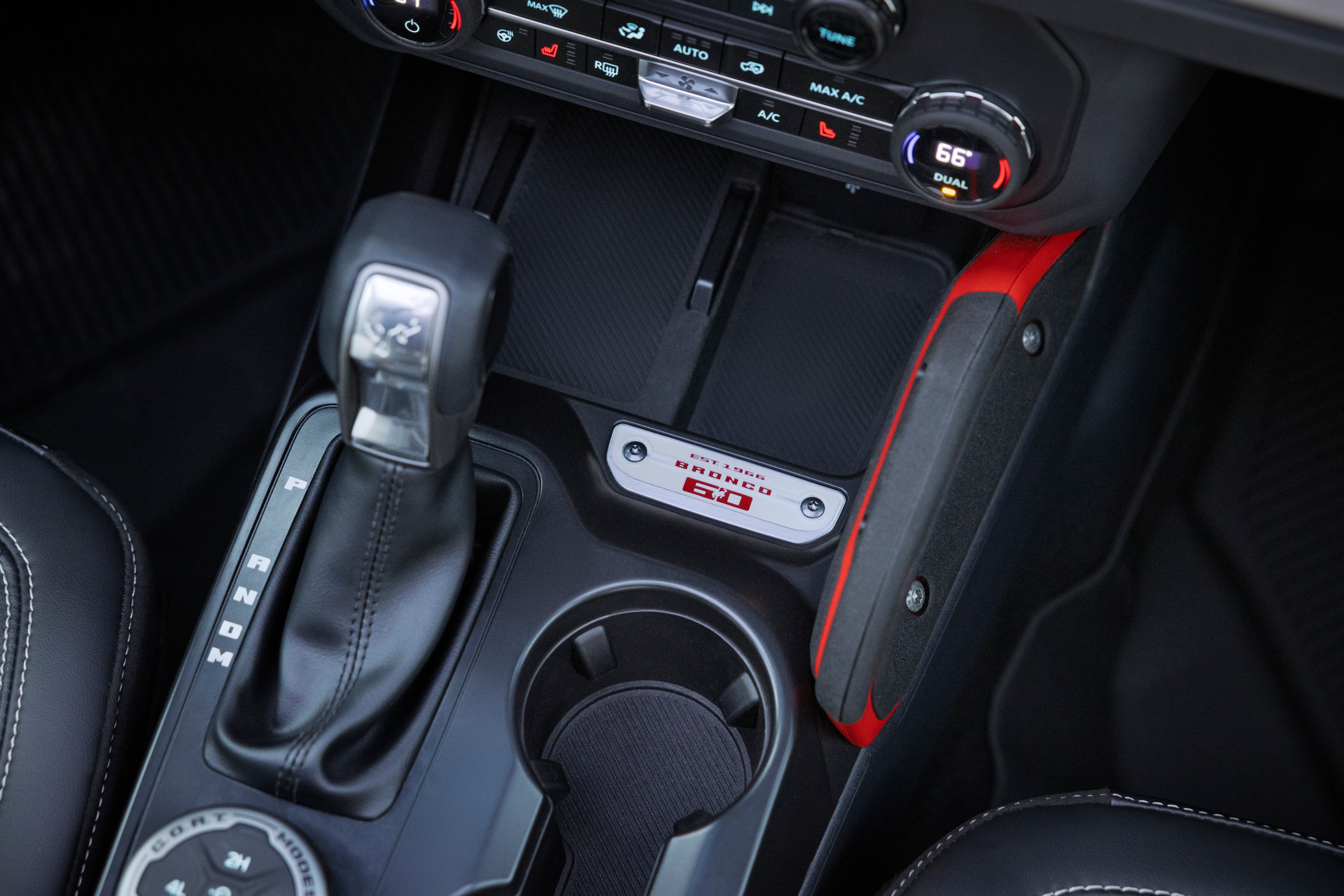 2026 Ford Bronco 60th Anniversary Package interior detail. 60th anniversary logo shown on console.